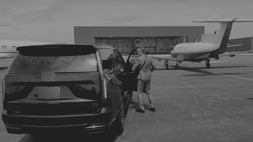 A protective agent working a principal's aircraft movement on the ramp